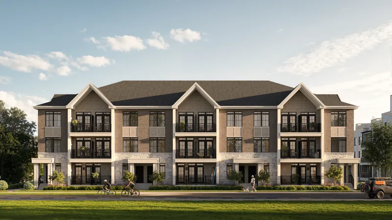 Rendering of the South Banks Elevation A townhome block with pitched-roof gables in warm brick